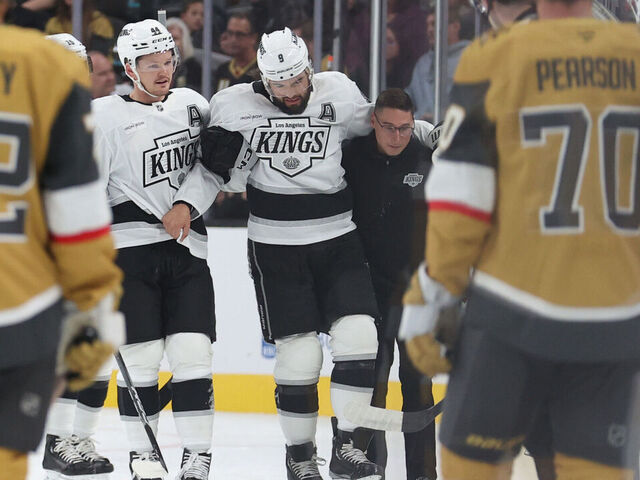 LAS VEGAS, NEVADA - SEPTEMBER 25: Drew Doughty #8 of the Los Angeles Kings reacts after suffering an injury during the first period against the Vegas Golden Knights at T-Mobile Arena on September 25, 2024 in Las Vegas, Nevada.