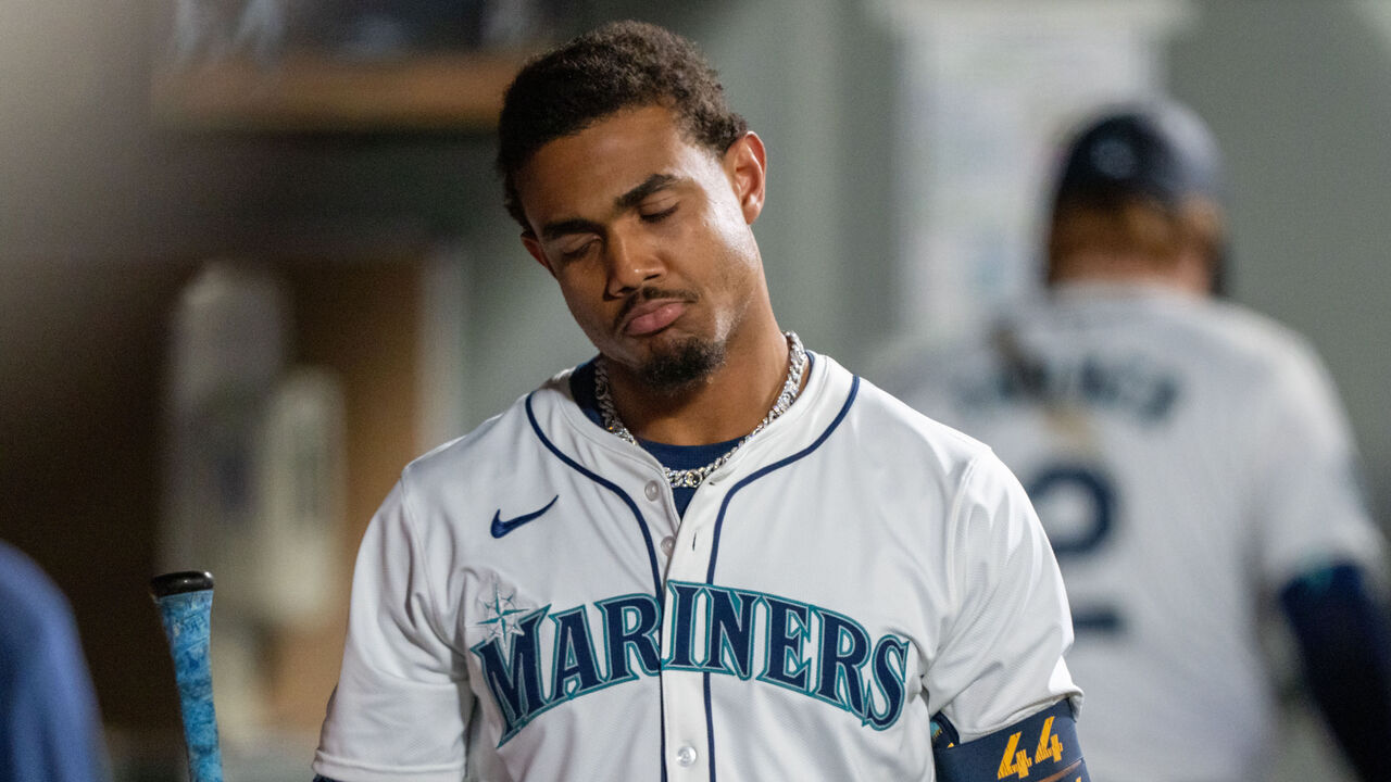 SEATTLE, WA - SEPTEMBER 18: Julio Rodriguez #44 of the Seattle Mariners reacts in the dugout after striking out during the fifth inning of a game against the New York Yankees at T-Mobile Park on September 18, 2024 in Seattle, Washington.