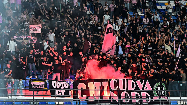 NAPLES, ITALY - SEPTEMBER 26: Fans of Palermo cheer during the Coppa Italia Frecciarossa match between SSC Napoli and Palermo at Stadio Diego Armando Maradona on September 26, 2024 in Naples, Italy.