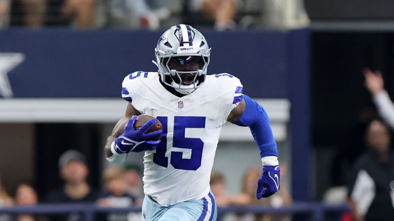 ARLINGTON, TX-SEPTEMBER 15: Ezekiel Elliott #15 of the Dallas Cowboys carries the ball against the New Orleans Saints during the game at AT&T Stadium on September 15, 2024 in Arlington, Texas.