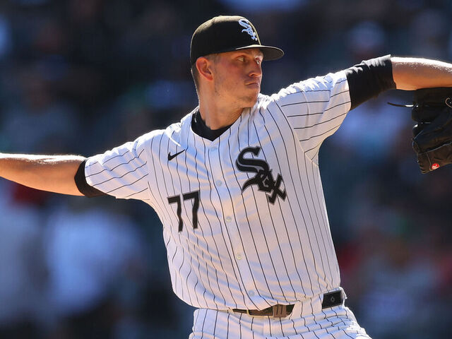 CHICAGO, ILLINOIS - SEPTEMBER 26: Chris Flexen #77 of the Chicago White Sox delivers a pitch fifth inning against the Los Angeles Angels at Guaranteed Rate Field on September 26, 2024 in Chicago, Illinois.