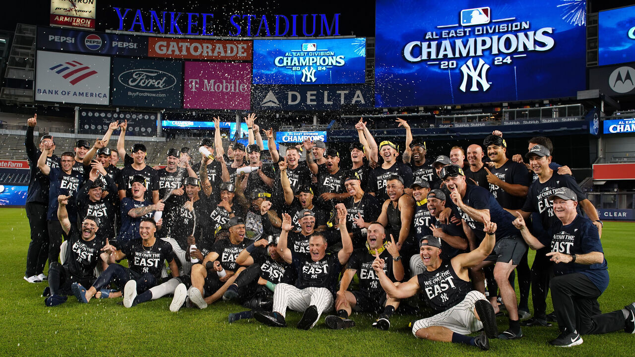 NEW YORK, NEW YORK - SEPTEMBER 26: The New York Yankees pose for a photo after celebrating winning the AL East title at Yankee Stadium on September 26, 2024 in New York City.