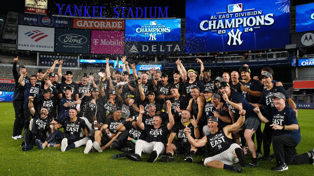 NEW YORK, NEW YORK - SEPTEMBER 26: The New York Yankees pose for a photo after celebrating winning the AL East title at Yankee Stadium on September 26, 2024 in New York City.
