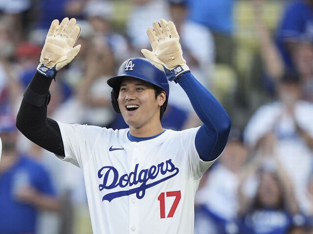 LOS ANGELES, CALIFORNIA - JULY 03: Freddie Freeman #5 of the Los Angeles Dodgers celebrates with his teammates Will Smith #16 and Shohei Ohtani #17 after hitting a three run home run during the first inning of a game between the Los Angeles Dodgers and the Arizona Diamondbacks at Dodger Stadium on July 03, 2024 in Los Angeles, California.