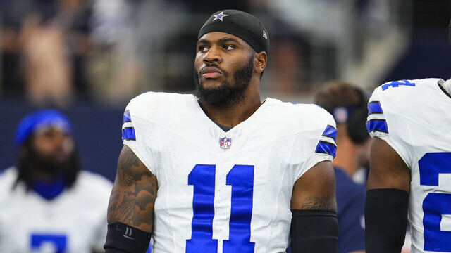 ARLINGTON, TX - SEPTEMBER 22: Micah Parsons #11 of the Dallas Cowboys looks on from the sideline prior to an NFL football game against the Baltimore Ravens at AT&T Stadium on September 22, 2024 in Arlington, Texas.