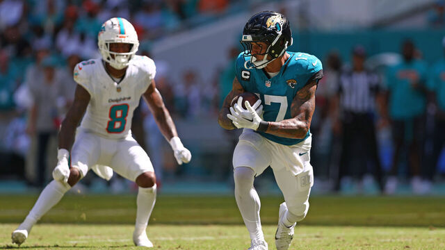 MIAMI GARDENS, FLORIDA - SEPTEMBER 08: Evan Engram #17 of the Jacksonville Jaguars runs after a catch during the fourth quarter against the Miami Dolphins at Hard Rock Stadium on September 08, 2024 in Miami Gardens, Florida.