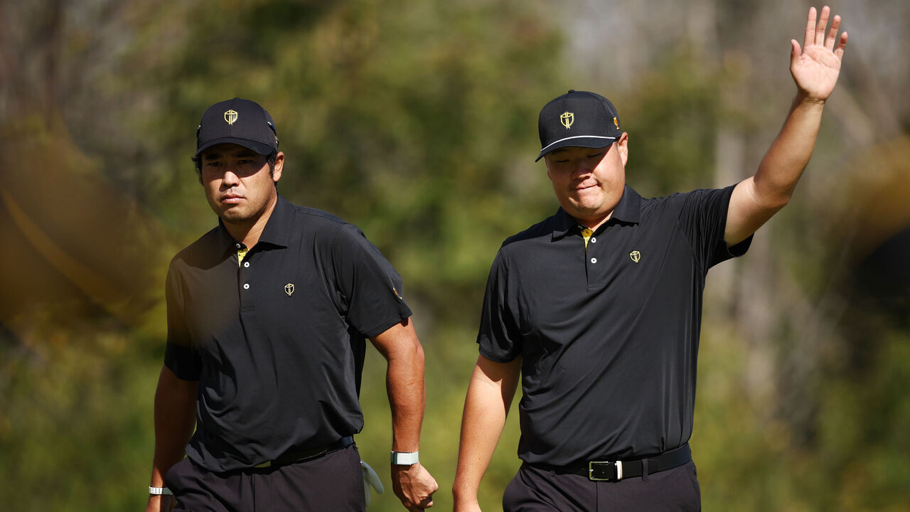 MONTREAL, QUEBEC - SEPTEMBER 27: Hideki Matsuyama (L) of Japan and Sungjae Im of South Korea and the International Team celebrate on the sixth green during Friday Foursomes on day two of the 2024 Presidents Cup at The Royal Montreal Golf Club on September 27, 2024 in Montreal, Quebec, Canada.