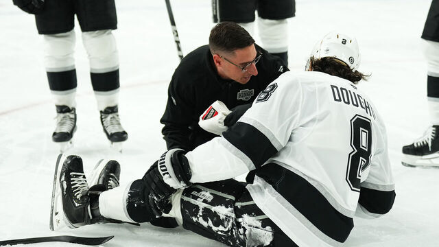 LAS VEGAS, NEVADA - SEPTEMBER 25: Drew Doughty #8 of the Los Angeles Kings reacts after suffering an injury during the first period against the Vegas Golden Knights at T-Mobile Arena on September 25, 2024 in Las Vegas, Nevada.
