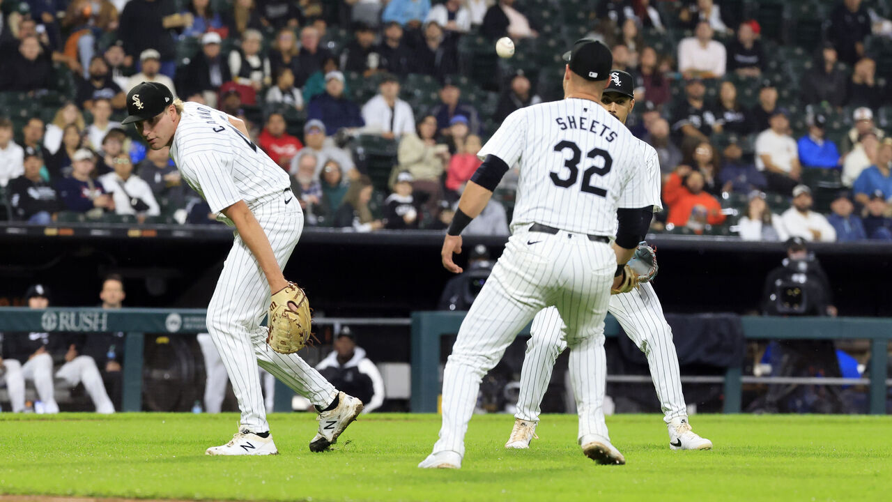 CHICAGO, ILLINOIS - SEPTEMBER 24: Jonathan Cannon #48, Gavin Sheets #32 and Eric Wagaman #34 of the Chicago White Sox drop a fly ball during the seventh inning against the Los Angeles Angels at Guaranteed Rate Field on September 24, 2024 in Chicago, Illinois.