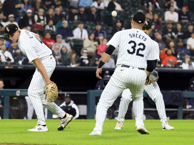 CHICAGO, ILLINOIS - SEPTEMBER 24: Jonathan Cannon #48, Gavin Sheets #32 and Eric Wagaman #34 of the Chicago White Sox drop a fly ball during the seventh inning against the Los Angeles Angels at Guaranteed Rate Field on September 24, 2024 in Chicago, Illinois.