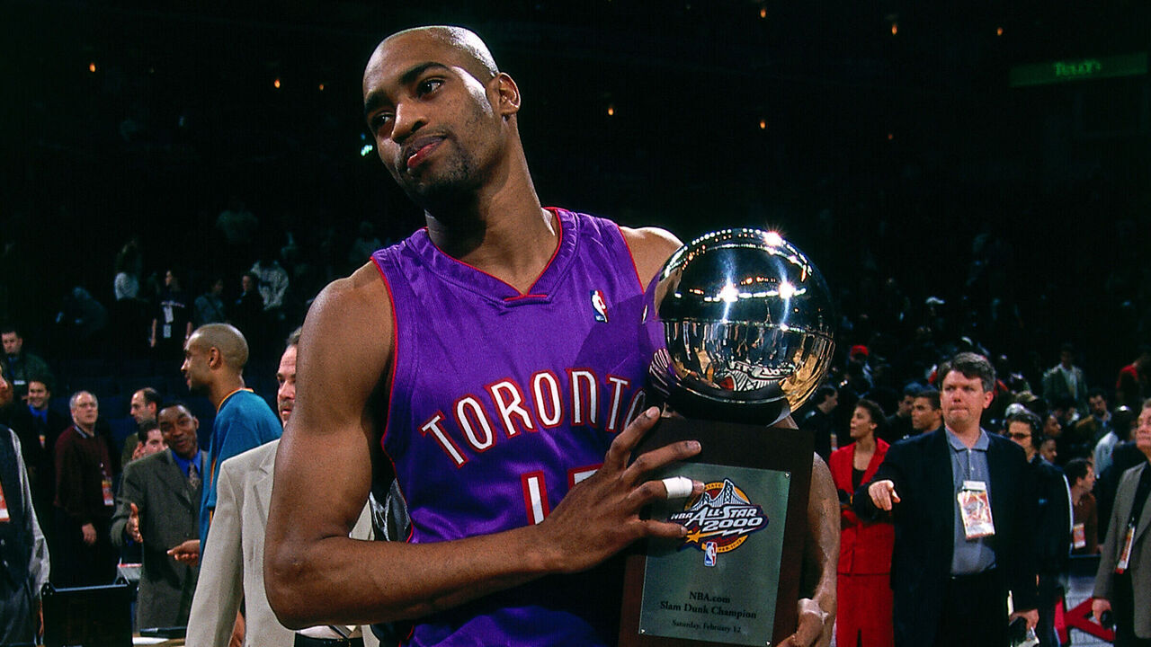 OAKLAND - FEBRUARY 12: Vince Carter #15 of the Toronto Raptors celebrates with the winning with he trophy during the 2000 NBA All Star Slam Dunk Contest at The Arena In Oakland on February 12, 2000 in Oakland, California. Mandatory copyright notice: Copyright NBAE 2000