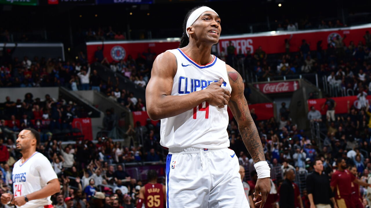 LOS ANGELES, CA - APRIL 7: Terance Mann #14 of the LA Clippers celebrates during the game against the Cleveland Cavaliers on April 7, 2024 at Crypto.Com Arena in Los Angeles, California. NOTE TO USER: User expressly acknowledges and agrees that, by downloading and/or using this Photograph, user is consenting to the terms and conditions of the Getty Images License Agreement. Mandatory Copyright Notice: Copyright 2024 NBAE