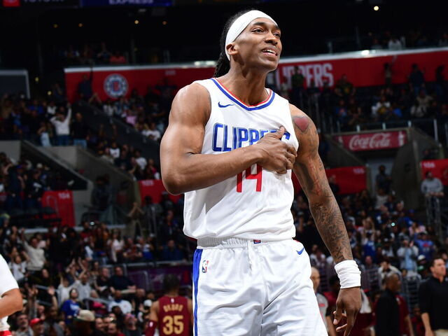 LOS ANGELES, CA - APRIL 7: Terance Mann #14 of the LA Clippers celebrates during the game against the Cleveland Cavaliers on April 7, 2024 at Crypto.Com Arena in Los Angeles, California. NOTE TO USER: User expressly acknowledges and agrees that, by downloading and/or using this Photograph, user is consenting to the terms and conditions of the Getty Images License Agreement. Mandatory Copyright Notice: Copyright 2024 NBAE