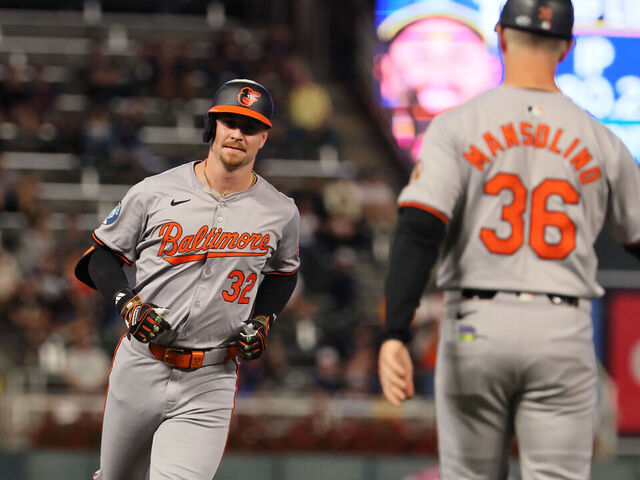 MINNEAPOLIS, MN - SEPTEMBER 27: Ryan O'Hearn #32 of the Baltimore Orioles hits a two run homer in the second inning against the Minnesota Twins at Target Field on September 27, 2024 in Minneapolis, Minnesota.
