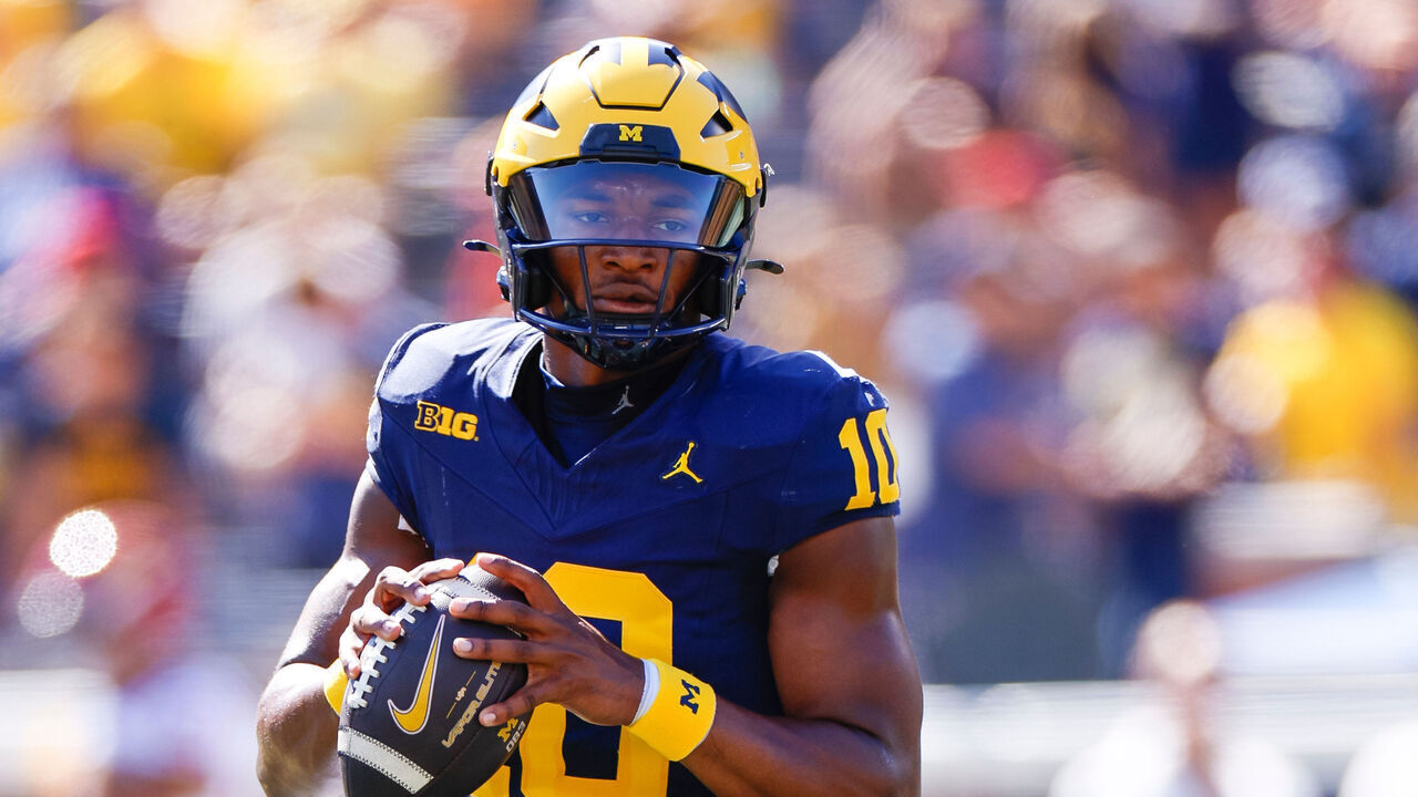 ANN ARBOR, MICHIGAN - SEPTEMBER 21: Alex Orji #10 of the Michigan Wolverines warms up prior to a game against the USC Trojans at Michigan Stadium on September 21, 2024 in Ann Arbor, Michigan.