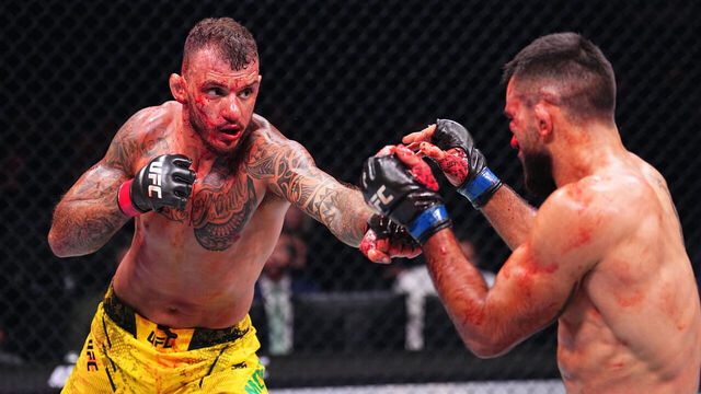 PARIS, FRANCE - SEPTEMBER 28: (L-R) Renato Moicano of Brazil punches Benoit Saint Denis of France in a lightweight fight during the UFC Fight Night event at The Accor Arena on September 28, 2024 in Paris, France.