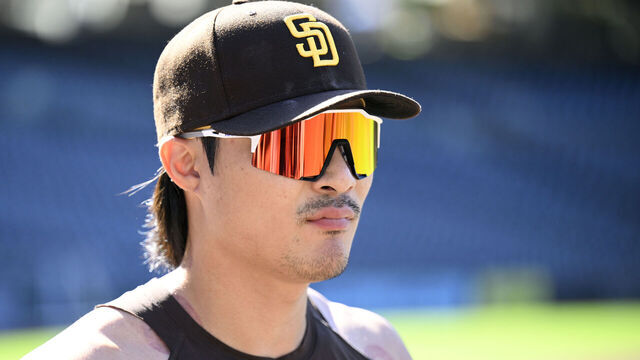 SAN DIEGO, CALIFORNIA - AUGUST 23: Ha-Seong Kim #7 of the San Diego Padres looks on before the game against the New York Mets at Petco Park on August 23, 2024 in San Diego, California.