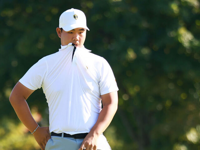 MONTREAL, QUEBEC - SEPTEMBER 28: Tom Kim of South Korea and the International Team looks on after a putt on the first green during Saturday Afternoon Foursomes on day three of the 2024 Presidents Cup at The Royal Montreal Golf Club on September 28, 2024 in Montreal, Quebec, Canada.