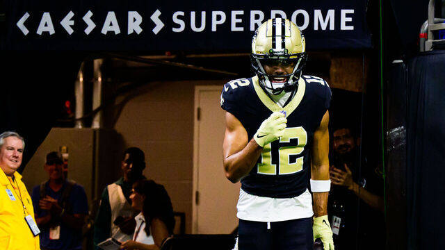 NEW ORLEANS, LOUISIANA - SEPTEMBER 22: Chris Olave #12 of the New Orleans Saints celebrates a touchdown reception against the Philadelphia Eagles during the fourth quarter at Caesars Superdome on September 22, 2024 in New Orleans, Louisiana.