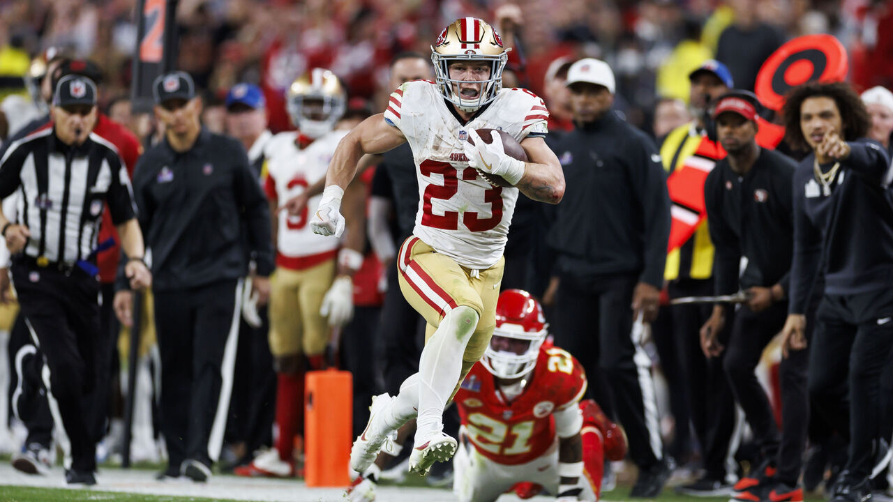 LAS VEGAS, NEVADA - FEBRUARY 11: Christian McCaffrey #23 of the San Francisco 49ers carries the ball on a run play during Super Bowl LVIII against the Kansas City Chiefs at Allegiant Stadium on February 11, 2024 in Las Vegas, Nevada.