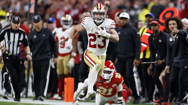 LAS VEGAS, NEVADA - FEBRUARY 11: Christian McCaffrey #23 of the San Francisco 49ers carries the ball on a run play during Super Bowl LVIII against the Kansas City Chiefs at Allegiant Stadium on February 11, 2024 in Las Vegas, Nevada.