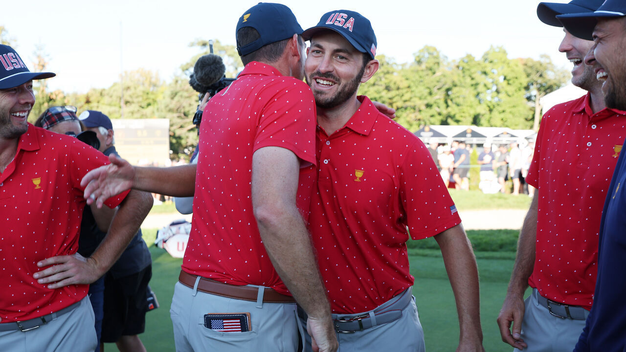 MONTREAL, QUEBEC - SEPTEMBER 29: Patrick Cantlay and Keegan Bradley of the U.S. Team celebrate after defeating the International Team during Sunday Singles on day four of the 2024 Presidents Cup at The Royal Montreal Golf Club on September 29, 2024 in Montreal, Quebec, Canada.