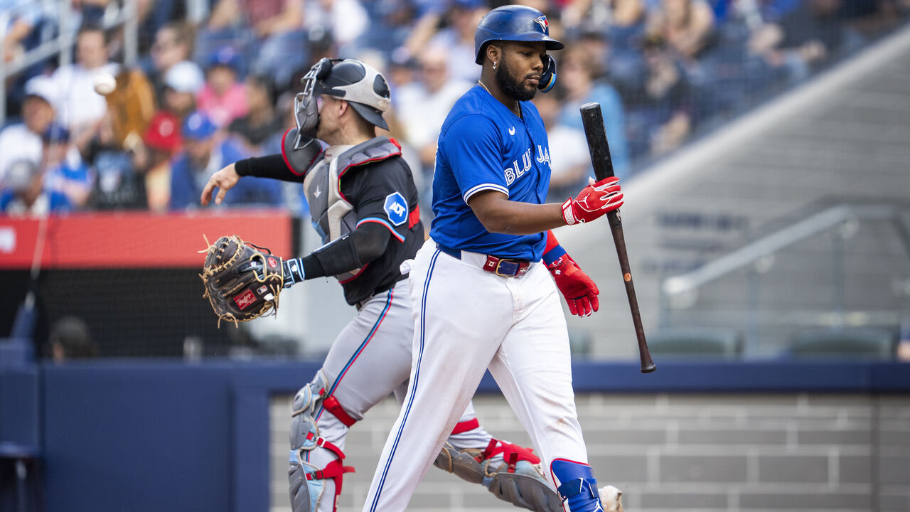 TORONTO, ON - SEPTEMBER 29: Vladimir Guerrero Jr. #27 of the Toronto Blue Jays reacts to striking out against the Miami Marlins during the fifteenth inning in their MLB game at the Rogers Centre on September 29, 2024 in Toronto, Ontario, Canada.