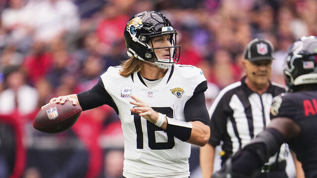 HOUSTON, TX - SEPTEMBER 29: Trevor Lawrence #16 of the Jacksonville Jaguars drops back to pass agains the Houston Texans during the first half of a football game at NRG Stadium on September 29, 2024 in Houston, Texas.