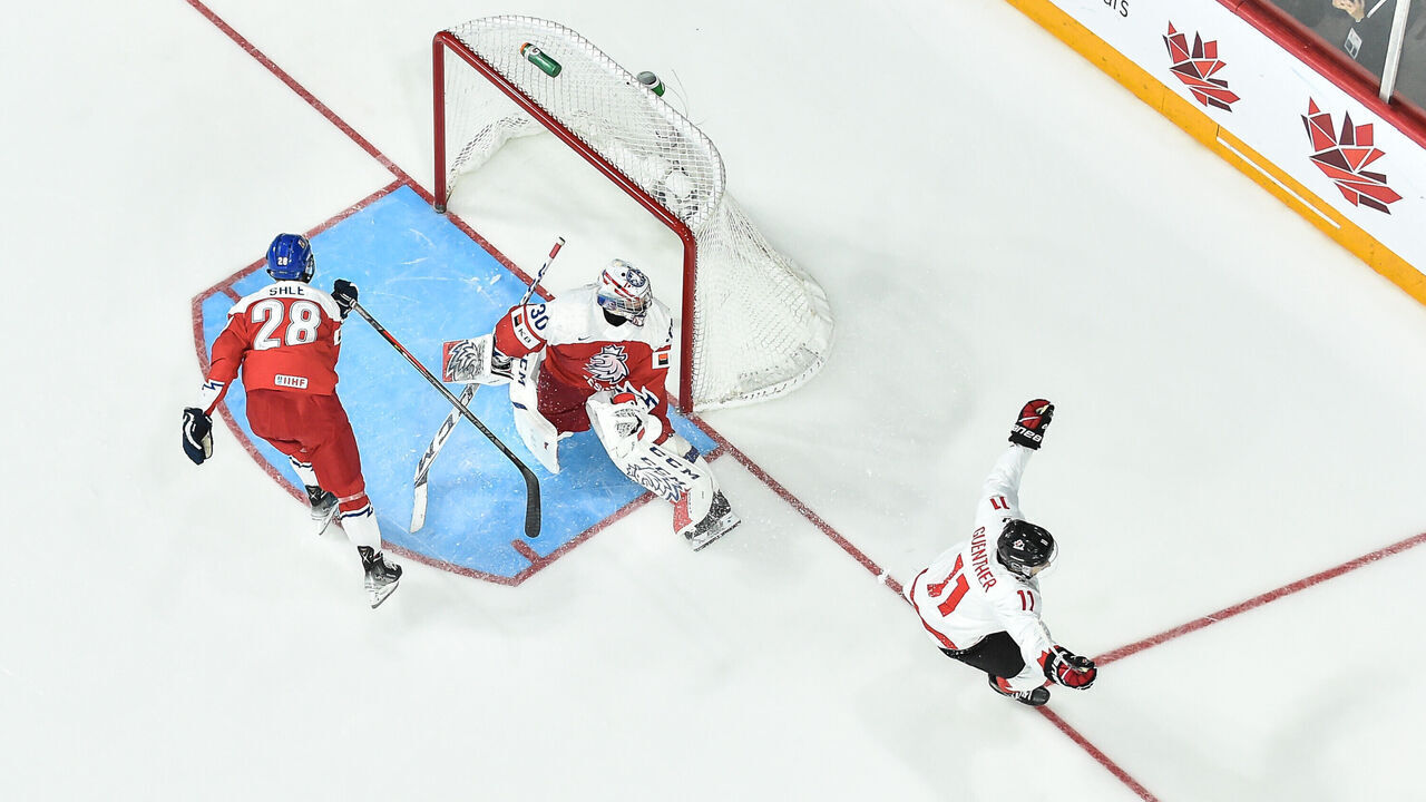 HALIFAX, CANADA - JANUARY 05: Goaltender Tomas Suchanek #30 of Team Czech Republic watches Dylan Guenther #11 of Team Canada celebrate his game-winning goal at the 2023 IIHF World Junior Championship at Scotiabank Centre on January 5, 2023 in Halifax, Nova Scotia, Canada. Team Canada defeated Team Czech Republic 3-2 in overtime and become the 2023 IIHF World Junior Champions.