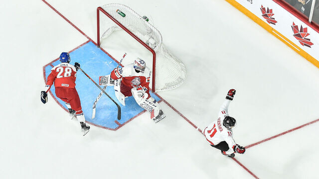HALIFAX, CANADA - JANUARY 05: Goaltender Tomas Suchanek #30 of Team Czech Republic watches Dylan Guenther #11 of Team Canada celebrate his game-winning goal at the 2023 IIHF World Junior Championship at Scotiabank Centre on January 5, 2023 in Halifax, Nova Scotia, Canada. Team Canada defeated Team Czech Republic 3-2 in overtime and become the 2023 IIHF World Junior Champions.