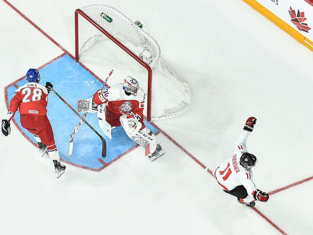 HALIFAX, CANADA - JANUARY 05: Goaltender Tomas Suchanek #30 of Team Czech Republic watches Dylan Guenther #11 of Team Canada celebrate his game-winning goal at the 2023 IIHF World Junior Championship at Scotiabank Centre on January 5, 2023 in Halifax, Nova Scotia, Canada. Team Canada defeated Team Czech Republic 3-2 in overtime and become the 2023 IIHF World Junior Champions.
