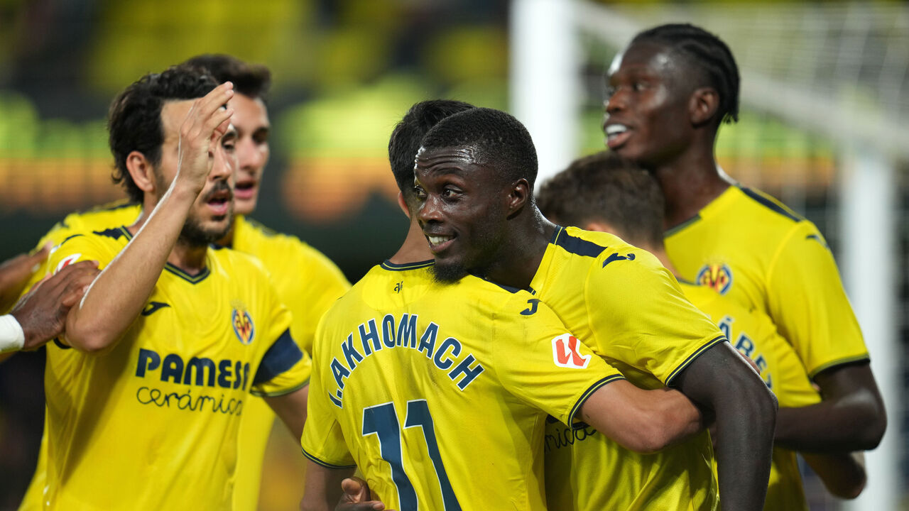 VILLARREAL, SPAIN - SEPTEMBER 30: Nicolas Pepe of Villarreal CF celebrates scoring his team's first goal with teammate Ilias Akhomach during the LaLiga match between Villarreal CF and UD Las Palmas at Estadio de la Ceramica on September 30, 2024 in Villarreal, Spain.