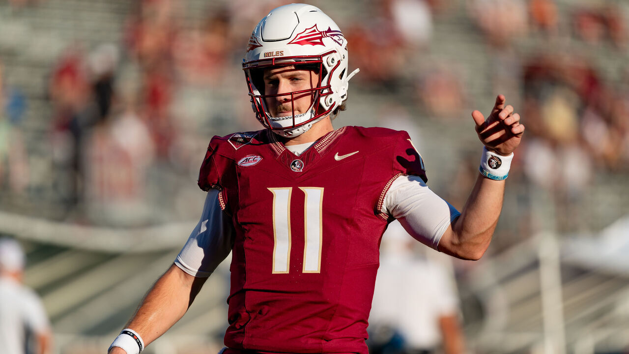 TALLAHASSEE, FL - SEPTEMBER 21:Florida State Seminoles quarterback Brock Glenn (11) warms up before a college football game between the California Golden Bears and the Florida State Seminoles on September 21st, 2024 at Doak Campbell Stadium in Tallahassee, FL.