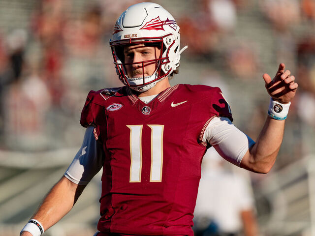 TALLAHASSEE, FL - SEPTEMBER 21:Florida State Seminoles quarterback Brock Glenn (11) warms up before a college football game between the California Golden Bears and the Florida State Seminoles on September 21st, 2024 at Doak Campbell Stadium in Tallahassee, FL.