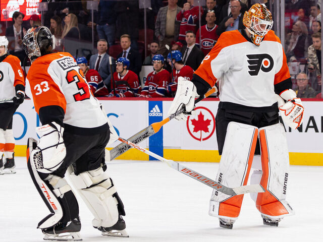 MONTREAL, CANADA - APRIL 9: Ivan Fedotov #82 of the Philadelphia Flyers replaces teammate Samuel Ersson #33 in the net during the second period of the NHL regular season game against the Montreal Canadiens at the Bell Centre on April 9, 2024 in Montreal, Quebec, Canada. The Montreal Canadiens defeated the Philadelphia Flyers by a score of 9-3.