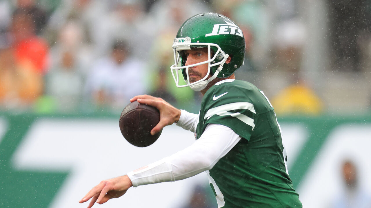 EAST RUTHERFORD, NEW JERSEY - SEPTEMBER 29: Aaron Rodgers (8) of the New York Jets passes against the Denver Broncos during the first quarter at MetLife Stadium on September 29, 2024 in East Rutherford, New Jersey.