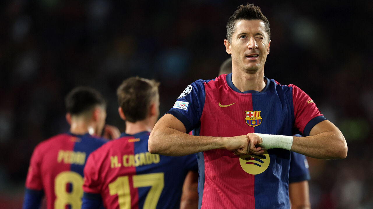 Barcelona's Polish forward #09 Robert Lewandowski celebrates scoring the opening goal during the UEFA Champions League, league phase day 2 football match between FC Barcelona and Young Boys at the Estadi Olimpic Lluis Companys in Barcelona on October 1, 2024.