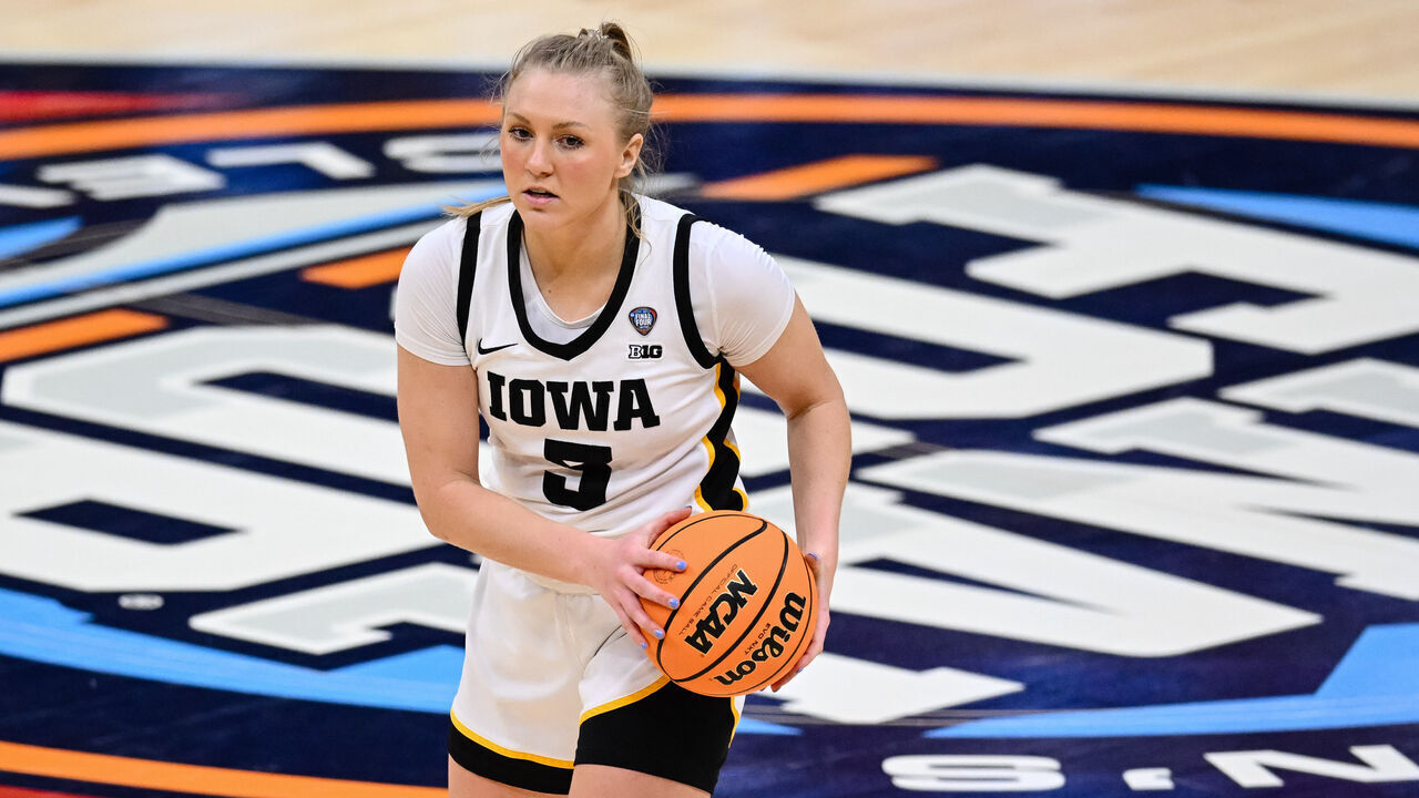 CLEVELAND, OH - APRIL 5: Sydney Affolter #3 of the Iowa Hawkeyes looks to pass the ball against the Connecticut Huskies during the second half in the NCAA Women's Basketball Tournament Final Four semifinal game between Connecticut and Iowa at Rocket Mortgage FieldHouse on April 5, 2024 in Cleveland, Ohio.