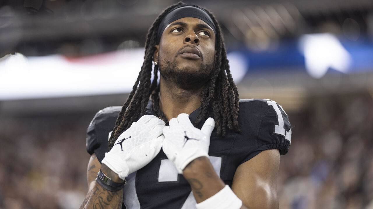 LAS VEGAS, NEVADA - DECEMBER 14: Davante Adams #17 of the Las Vegas Raiders looks on during the national anthem prior to an NFL football game between the Las Vegas Raiders and the Los Angeles Chargers at Allegiant Stadium on December 14, 2023 in Las Vegas, Nevada.