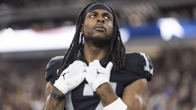 LAS VEGAS, NEVADA - DECEMBER 14: Davante Adams #17 of the Las Vegas Raiders looks on during the national anthem prior to an NFL football game between the Las Vegas Raiders and the Los Angeles Chargers at Allegiant Stadium on December 14, 2023 in Las Vegas, Nevada.
