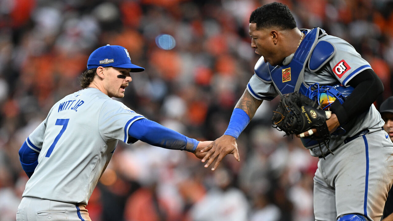 BALTIMORE, MARYLAND - OCTOBER 01: Bobby Witt Jr. #7 and Salvador Perez #13 of the Kansas City Royals celebrate after their team defeated the Baltimore Orioles in Game One of the Wild Card Series at Oriole Park at Camden Yards on October 01, 2024 in Baltimore, Maryland.