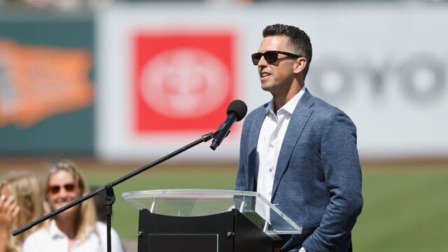 SAN FRANCISCO, CALIFORNIA - JULY 13: Former San Francisco Giants player Buster Posey talks during a Wall of Fame induction ceremony before the game between the San Francisco Giants and the Minnesota Twins at Oracle Park on July 13, 2024 in San Francisco, California.
