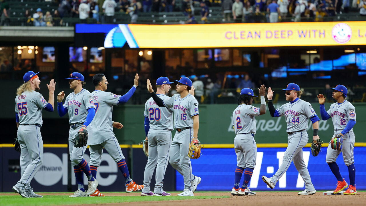 MILWAUKEE, WISCONSIN - OCTOBER 01: The New York Mets celebrate after beating the Milwaukee Brewers 8-4 in Game One of the Wild Card Series at American Family Field on October 01, 2024 in Milwaukee, Wisconsin.