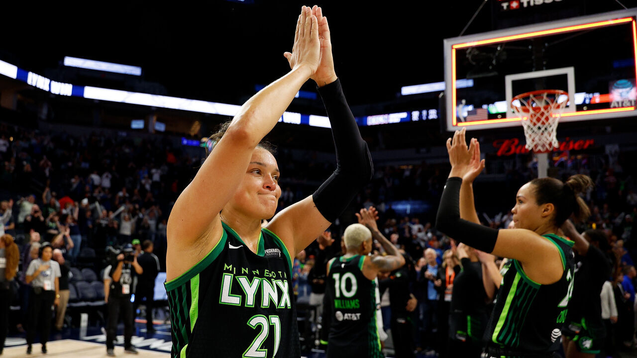 MINNEAPOLIS, MINNESOTA - OCTOBER 01: Kayla McBride #21 of the Minnesota Lynx celebrates after Game Two of the Semi-Finals against the Connecticut Sun during the WNBA Playoffs at Target Center on October 01, 2024 in Minneapolis, Minnesota. The Lynx defeated the Sun 77-70.