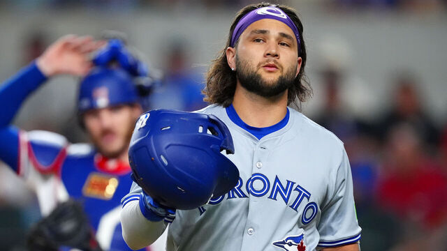 ARLINGTON, TEXAS - SEPTEMBER 17: Bo Bichette #11 of the Toronto Blue Jays reacts after striking out during the first inning against the Texas Rangers at Globe Life Field on September 17, 2024 in Arlington, Texas.