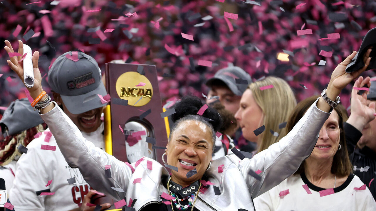 CLEVELAND, OHIO - APRIL 07: Head coach Dawn Staley of the South Carolina Gamecocks celebrates after beating the Iowa Hawkeyes in the 2024 NCAA Women's Basketball Tournament National Championship at Rocket Mortgage FieldHouse on April 07, 2024 in Cleveland, Ohio. South Carolina beat Iowa 87-75