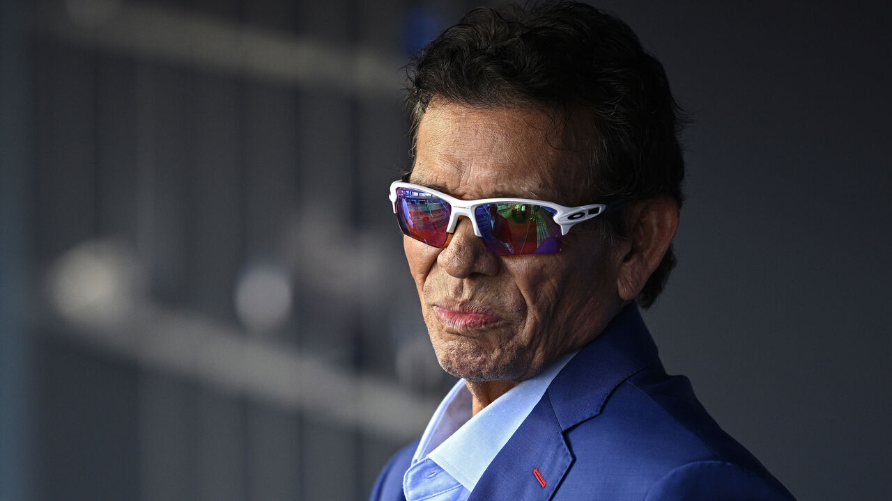 LOS ANGELES, CALIFORNIA - AUGUST 10: Former Los Angeles Dodgers pitcher Fernando Valenzuela looks on from the dugout before the game against the Pittsburgh Pirates at Dodger Stadium on August 10, 2024 in Los Angeles, California.