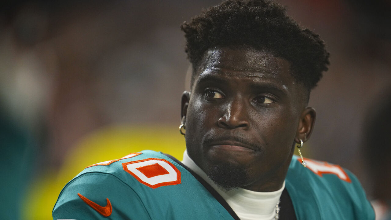 MIAMI GARDENS, FL - SEPTEMBER 12: Tyreek Hill #10 of the Miami Dolphins looks on from the sideline prior to an NFL football game against the Buffalo Bills at Hard Rock Stadium on September 12, 2024 in Miami Gardens, Florida.
