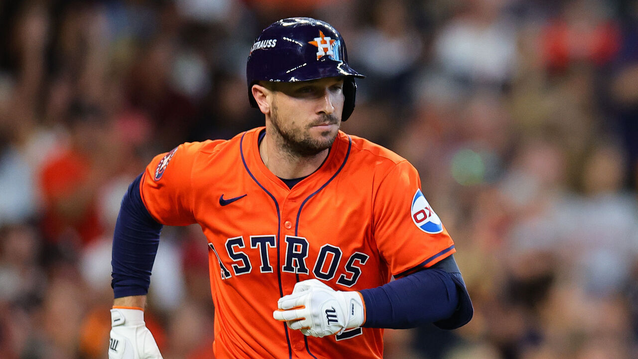 HOUSTON, TEXAS - OCTOBER 02: Alex Bregman #2 of the Houston Astros runs to first base after hitting a single against the Detroit Tigers in the second inning during Game Two of the Wild Card Series at Minute Maid Park on October 02, 2024 in Houston, Texas.