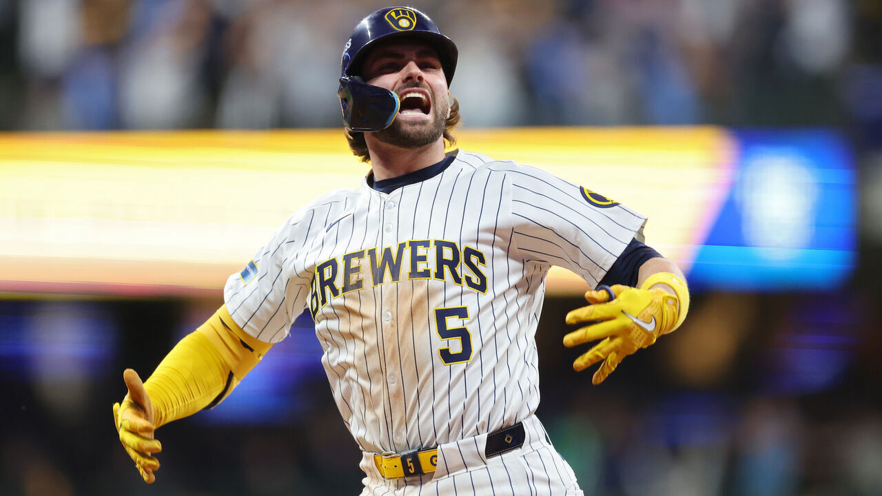 MILWAUKEE, WISCONSIN - OCTOBER 02: Garrett Mitchell #5 of the Milwaukee Brewers celebrates after hitting a home run in the eighth inning against the New York Mets during Game Two of the Wild Card Series at American Family Field on October 02, 2024 in Milwaukee, Wisconsin.
